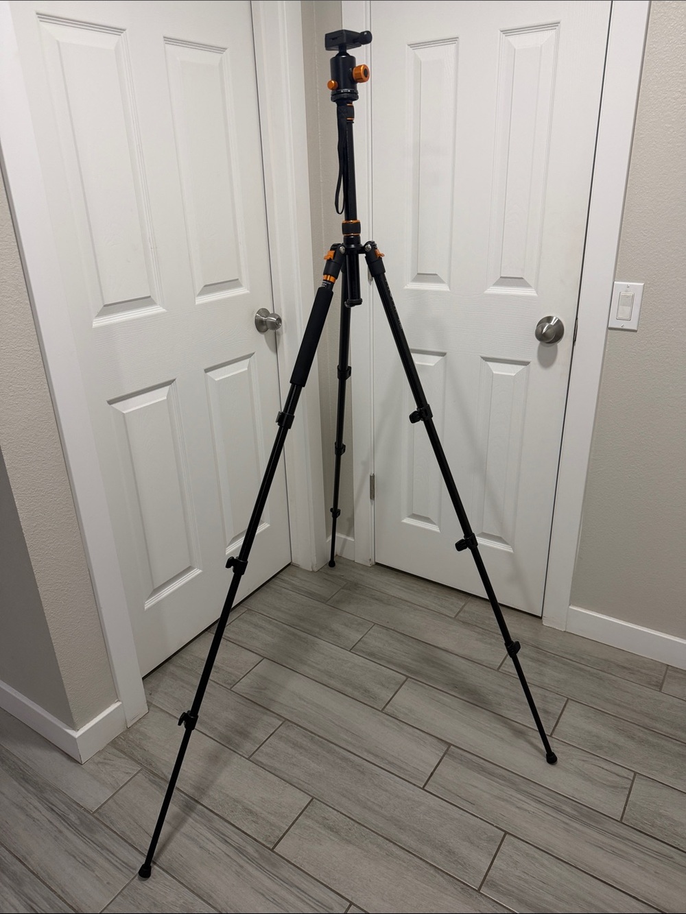 Black and Orange Camera Tripod with Carry Bag